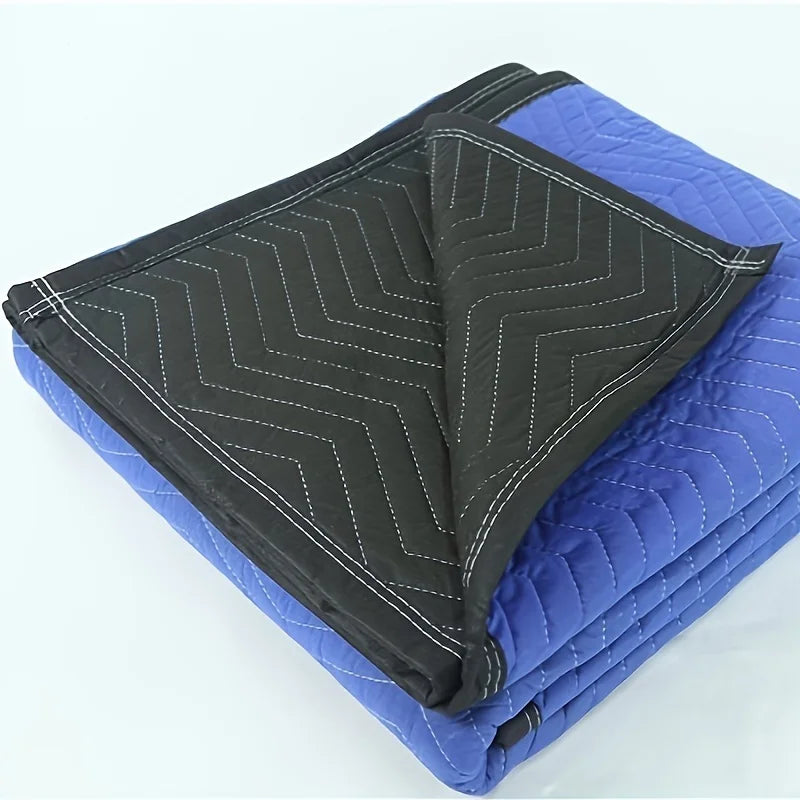 Mobile blanket-- heavy-duty packaging blanket folded, showcasing blue and black fabric textures.