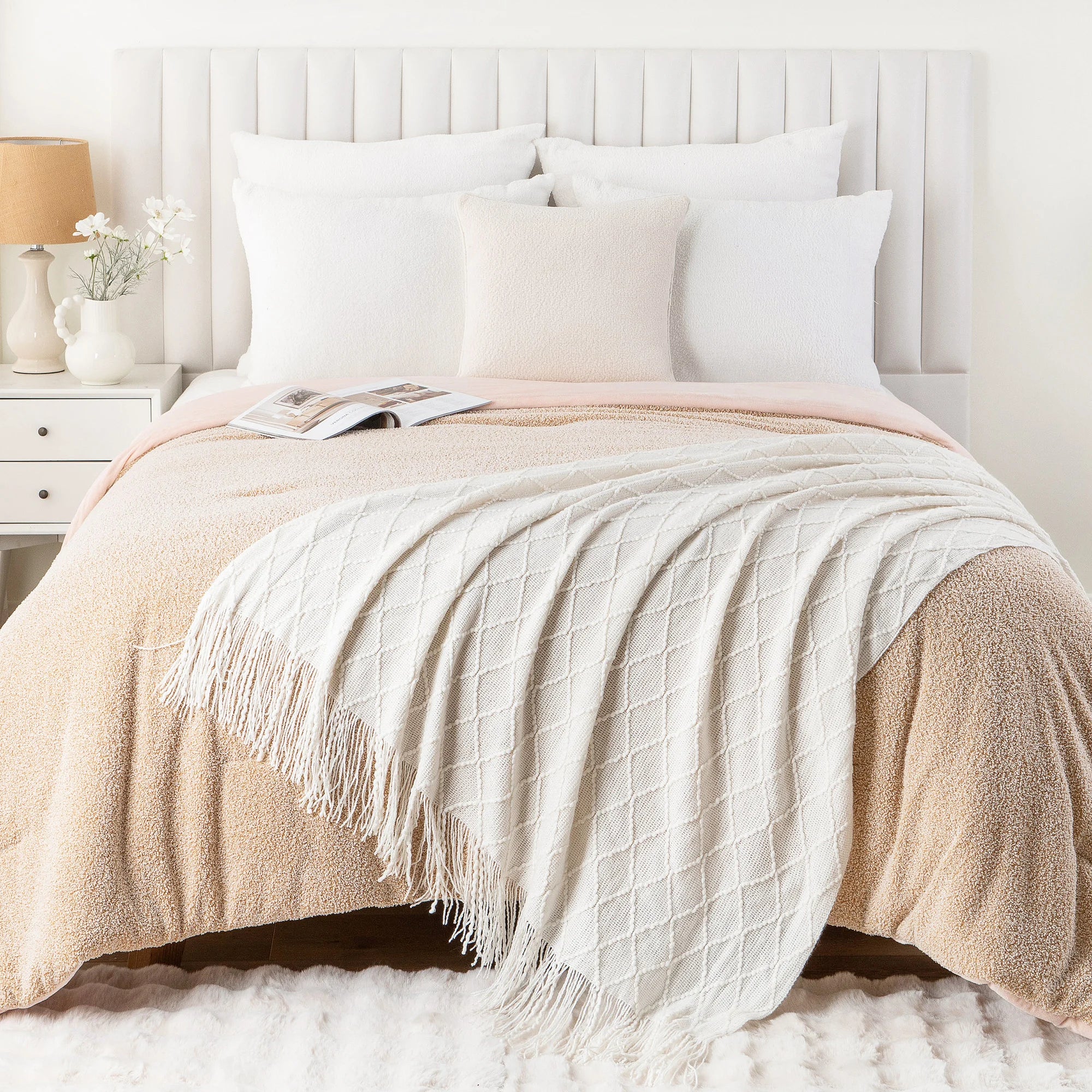 Battilo Plaid Knitted Throw Blanket Soft Woven Throws Sofa Blanket draped over a sofa arm.
